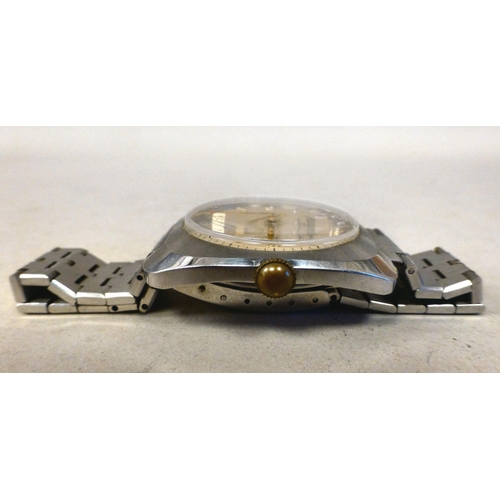 18 - A JW Benson stainless steel cased manual bracelet watch, faced by a baton and Arabic dial