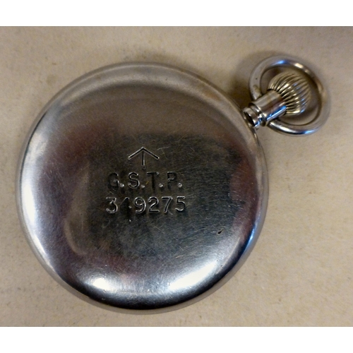20 - A World War II military white metal cased pocket watch, stamped GSTP 349275, faced by an Arabic dial