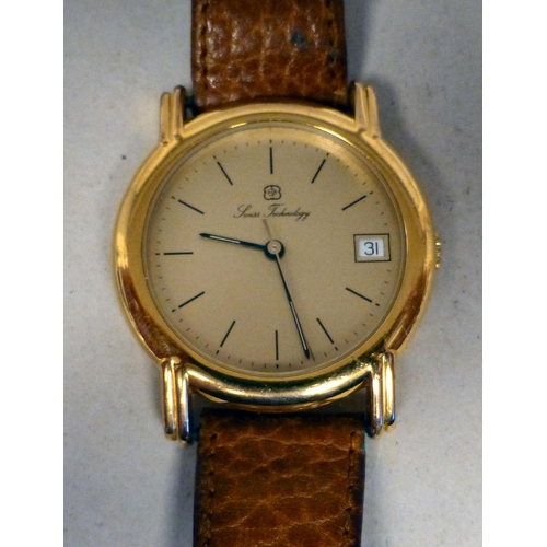 23 - An ETA Swiss Technology, gold plated automatic wristwatch, faced by a baton dial and date aperture