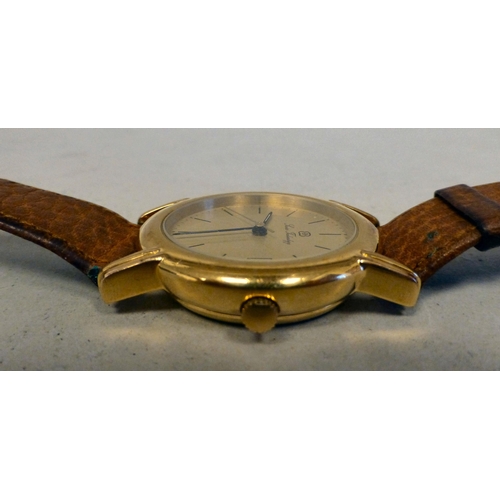 23 - An ETA Swiss Technology, gold plated automatic wristwatch, faced by a baton dial and date aperture
