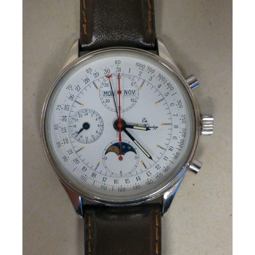 25 - An ETA stainless steel cased, automatic chronograph 7751, calendar moonphase wristwatch, faced by an... 