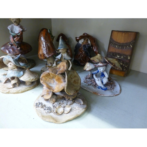 251 - Studio pottery sculptures: to include a gnome on a toadstool&nbsp; 9