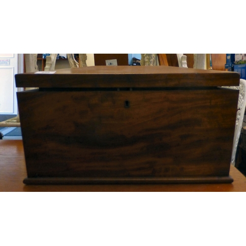 258 - A Regency mahogany tea caddy of sarcophagus form&nbsp; bears an engraved plate&nbsp; 9