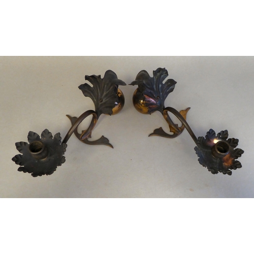 26 - A pair of late 19thC Bensons copper and brass counterbalanced table candlesticks with naturalistical... 