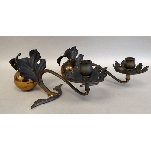 26 - A pair of late 19thC Bensons copper and brass counterbalanced table candlesticks with naturalistical... 