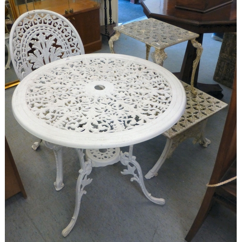 262 - Modern white painted aluminium furniture: to include a side table, raised on scrolled legs&nbsp; 27