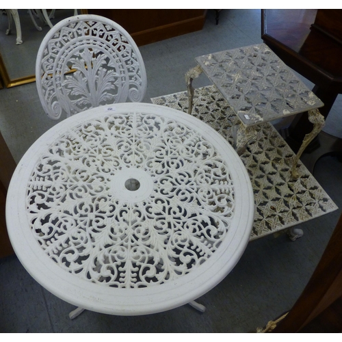 262 - Modern white painted aluminium furniture: to include a side table, raised on scrolled legs&nbsp; 27