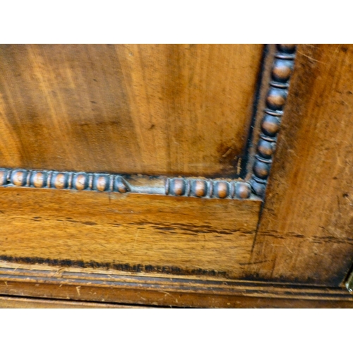 263 - A George III mahogany linen press with two doors, over two short/two long drawers, raised on bracket... 