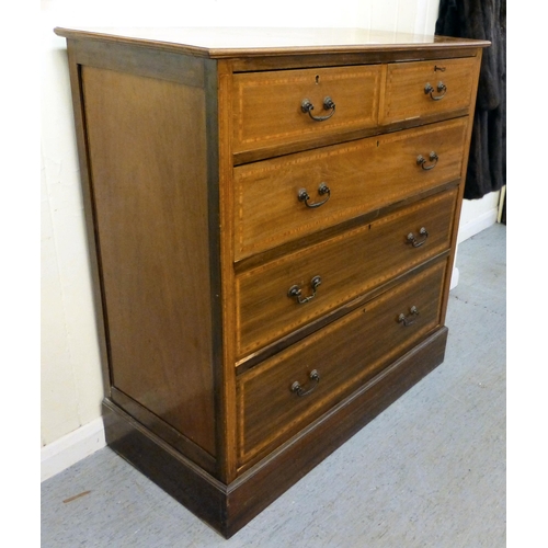 264 - An Edwardian satinwood inlaid mahogany dressing chest with two short/three long drawers, on a plinth... 