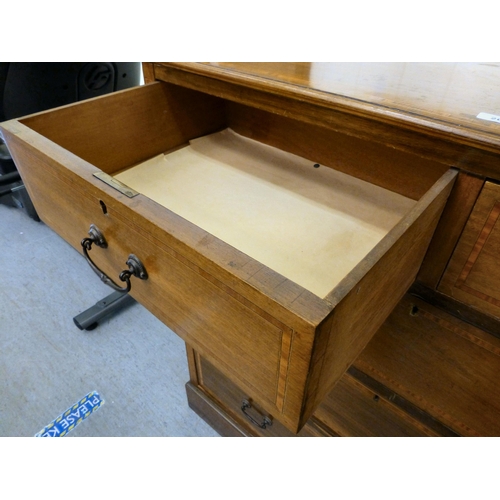 264 - An Edwardian satinwood inlaid mahogany dressing chest with two short/three long drawers, on a plinth... 