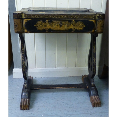 265 - A late Victorian chinoiserie design, black lacquered and gilded work table, the hinged lid enclosing... 