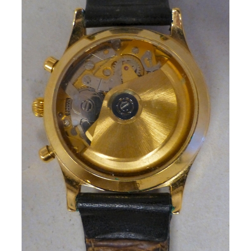27 - A Bravington's gold plated automatic chronograph with a calendar moonphase, faced by a baton dial