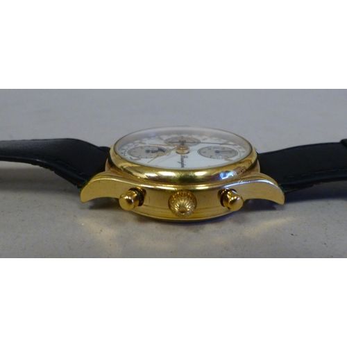 27 - A Bravington's gold plated automatic chronograph with a calendar moonphase, faced by a baton dial