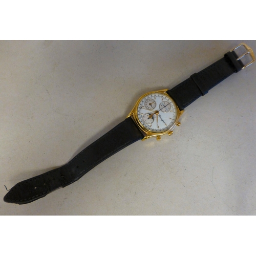 27 - A Bravington's gold plated automatic chronograph with a calendar moonphase, faced by a baton dial