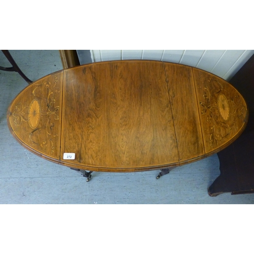 272 - An Edwardian string and marquetry inlaid, rosewood side table, the lozenge shaped top with two fall-... 