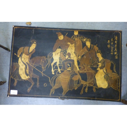 277 - A modern chinoiserie design black lacquered chest, decorated with figures on horseback  15.5