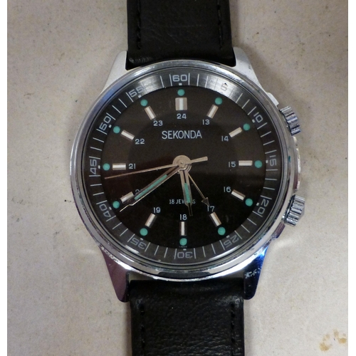 28 - A Sekonda stainless steel cased manual alarm watch, faced by a baton dial