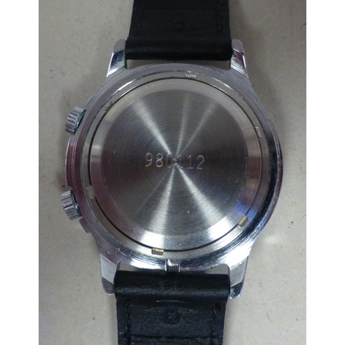 28 - A Sekonda stainless steel cased manual alarm watch, faced by a baton dial