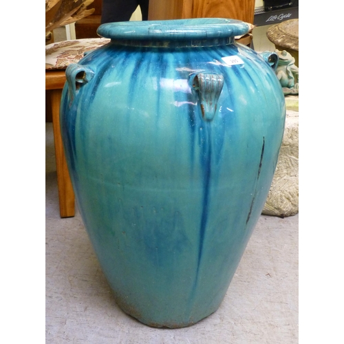 285 - A pottery garden vase with streaky turquoise glazed decoration&nbsp; 25