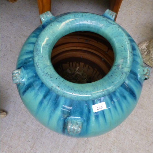 285 - A pottery garden vase with streaky turquoise glazed decoration&nbsp; 25