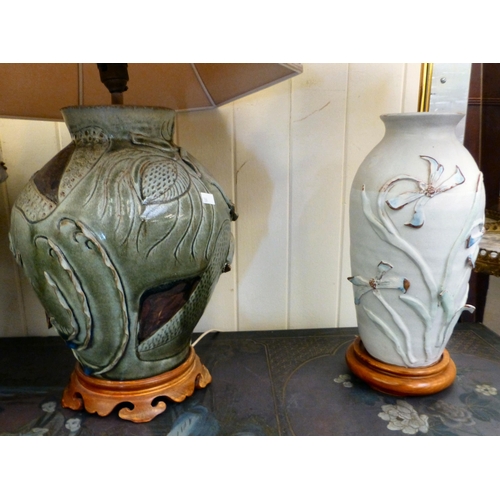 286 - Pottery table lamps: to include a Chinese inspired example, decorated in relief with flora&nbsp; 14