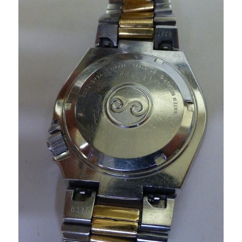 310 - A Seiko Sport 100 stainless steel cased bracelet watch, faced by a baton dial&nbsp;