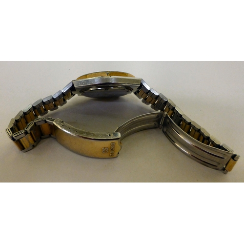 310 - A Seiko Sport 100 stainless steel cased bracelet watch, faced by a baton dial&nbsp;