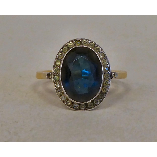 35 - An 18ct gold cluster ring, set with blue and white stones&nbsp; (approx. weight 4.9 grams)