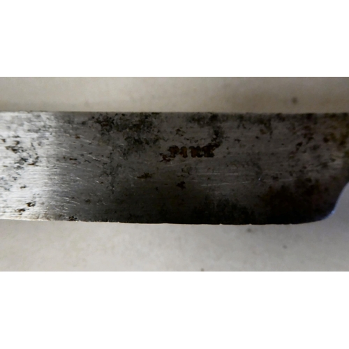 36 - A late 18thC Scottish steel knife and fork, each with a carved rope knot design handle