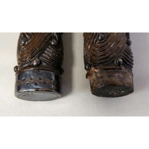 36 - A late 18thC Scottish steel knife and fork, each with a carved rope knot design handle