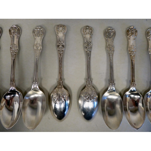 37 - A matched set of twelve silver Queens pattern dessert spoons  mixed Victorian and later marks  (appr... 
