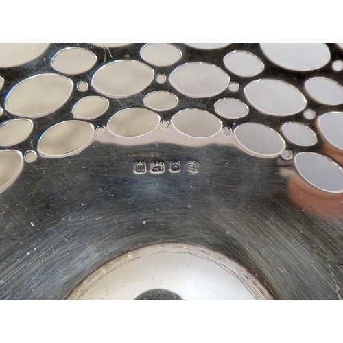 38 - A pair of silver sweet baskets with opposing handles and reticulated sides&nbsp; A&J Zimmerman&n... 