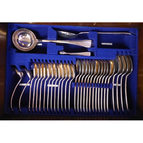 48 - A Walker & Hall stainless steel canteen, comprising twelve place settings, on simulated bone han... 