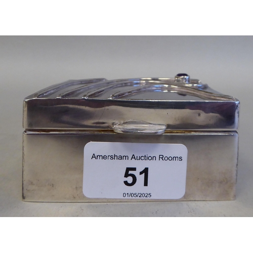 51 - A  modern Arts & Crafts Meredith Jewellery silver trinket box, the hinged lid decorated with swi... 