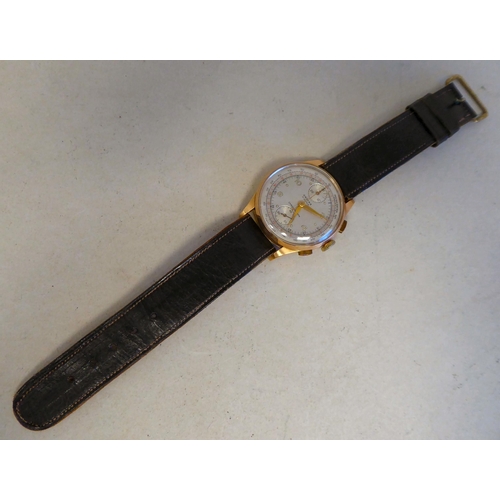 54 - An Orfina chronograph 18ct gold cased, manual wristwatch, faced by an Arabic dial and subsidiary sec... 