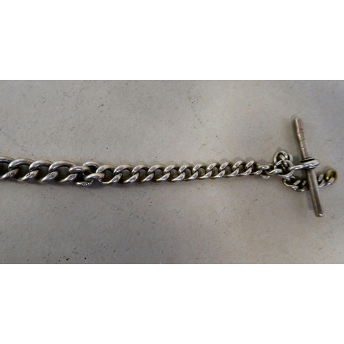 56 - Silver collectables: to include a charm bracelet&nbsp; (approx. gross weight 135 grams)