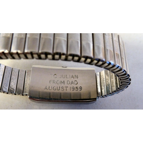 57 - An Omega stainless steel cased manual, bracelet Tank watch, faced by a baton dial and subsidiary sec... 