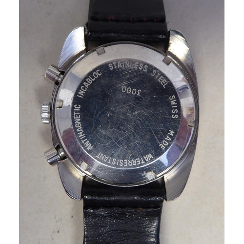 59 - A Fulton Officer chronograph, stainless steel cased wristwatch, faced by a baton dial and three subs... 