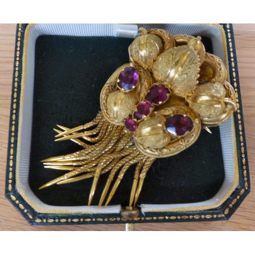 8 - A yellow metal and coloured stone set brooch&nbsp; boxed&nbsp; (approx. gross weight 19.5 grams)