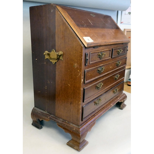 9 - A modern Korean teak Georgian style bureau, in the manner of a trader's sample with brass fittings  ... 