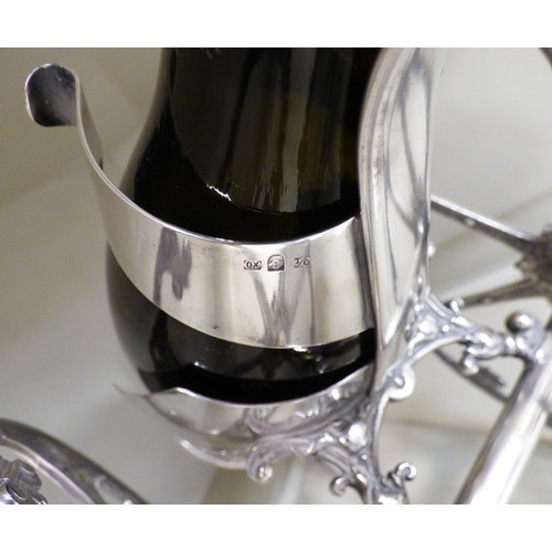 11 - A WMF silver plated wine cannon, on two wheels  7.5