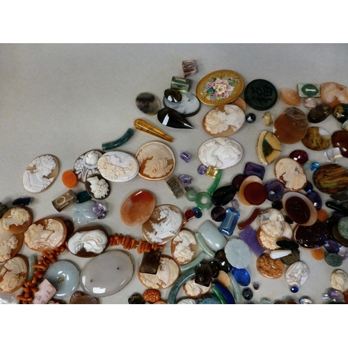 127 - Items of personal ornament: to include loose coloured stones; coral fragments; and unmounted cameos