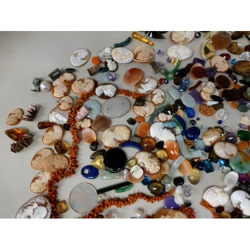 127 - Items of personal ornament: to include loose coloured stones; coral fragments; and unmounted cameos