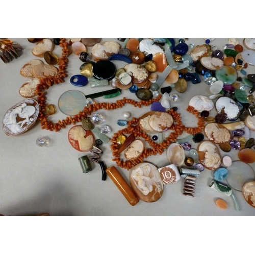 127 - Items of personal ornament: to include loose coloured stones; coral fragments; and unmounted cameos
