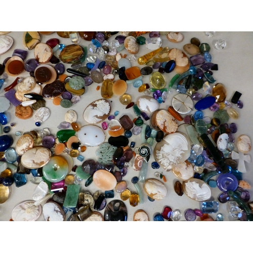 127 - Items of personal ornament: to include loose coloured stones; coral fragments; and unmounted cameos