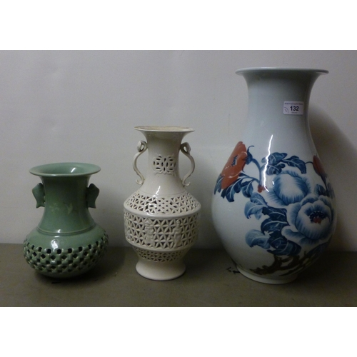 132 - Three modern Chinese vases: to include a porcelain example, decorated with flora&nbsp; 14