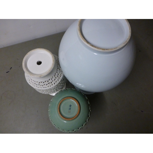 132 - Three modern Chinese vases: to include a porcelain example, decorated with flora&nbsp; 14