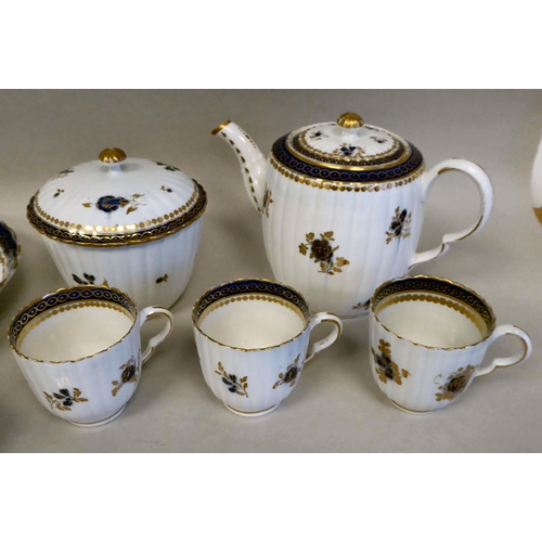 165 - Late 18thC Caughley porcelain teaware, decorated in gilded blue and white with floral sprigs and oth... 