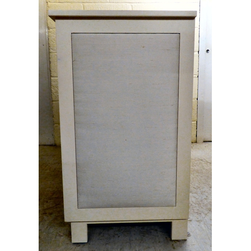 170 - A modern white painted dressing chest with six drawers, each covered with a fabric panel front, rais... 