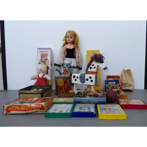 180 - Vintage toys: to include 'Ernest the Balancing Bear'; marbles and a Pelham puppet 'Pinocchio'